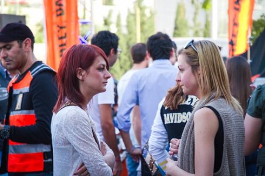 two women have a conversation