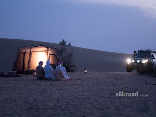 Friends seated in prayer