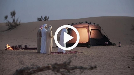 Friends praying outside