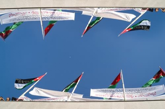 jordan flags rising in a protest