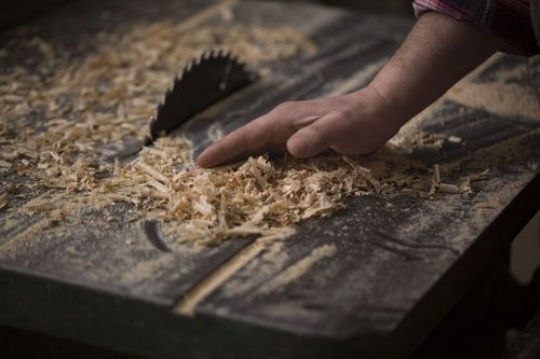 Man cleaning the dust