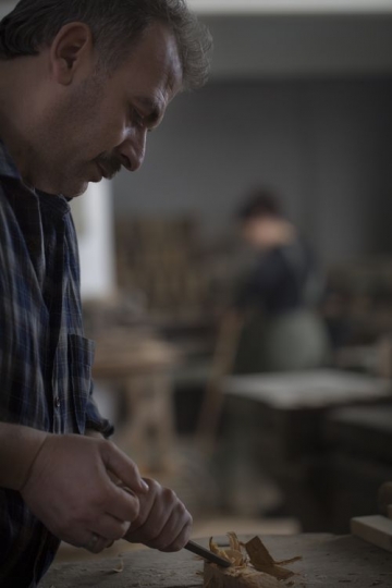 Man working with the wood