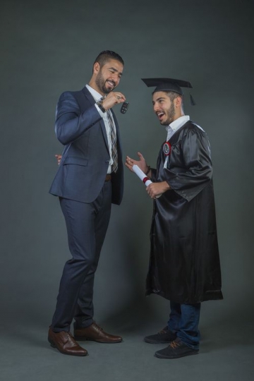 An Arab Dad Greeting Son on Gradutaion|-