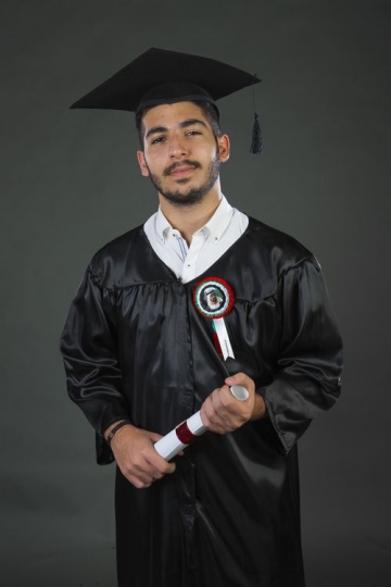 Middle Eastern man graduated