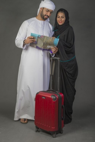 Middle Eastern couple on vacation|-