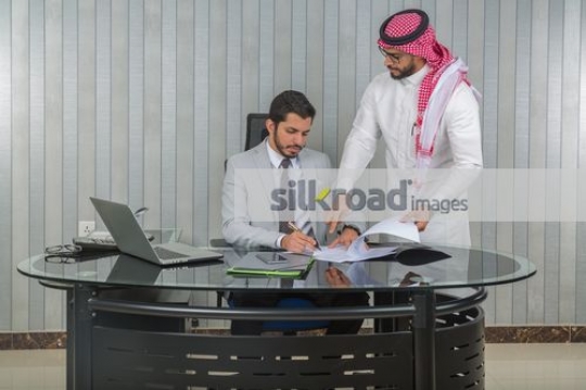 Businessmen at the office working|